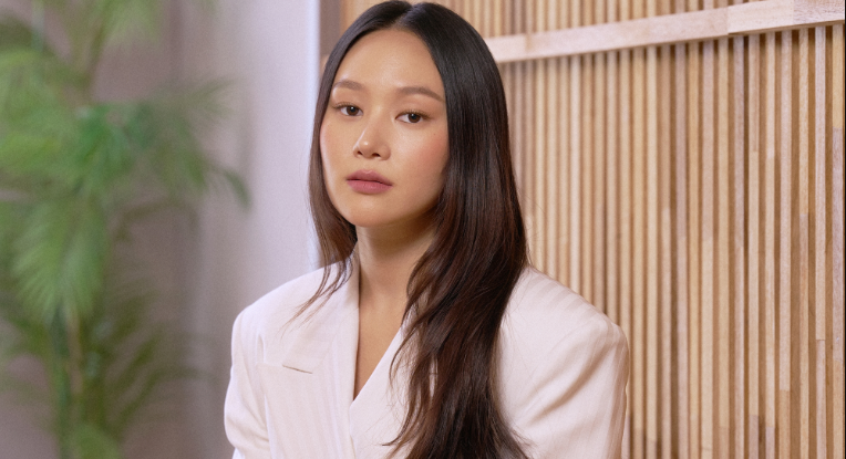 Yerin Ha looking elegant on the set of Bridgerton Season 4 as her character Sophie