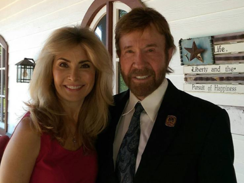 Former model Gena O’Kelley smiling warmly at a public event, highlighting her early career and background.