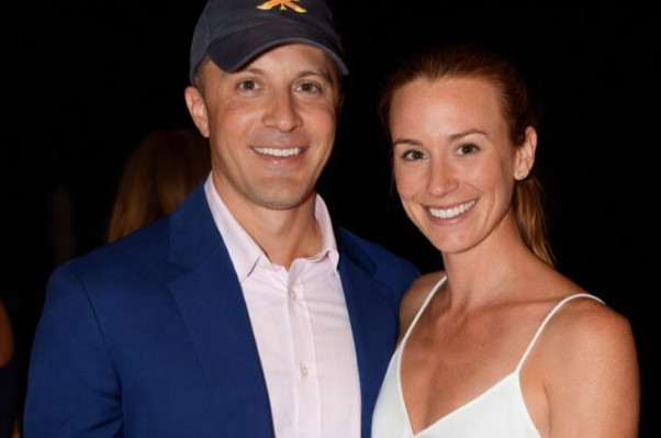 Emily Threlkeld attending a red carpet event with her husband, Harold Ford Jr