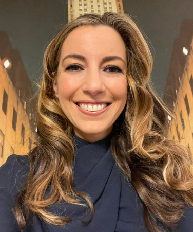 Kristy Greenberg speaking during a legal analysis segment on television.