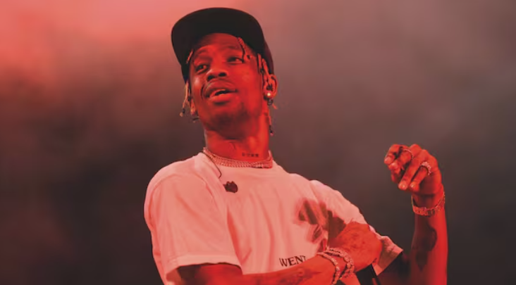 Travis Scott performing live on stage during a concert
