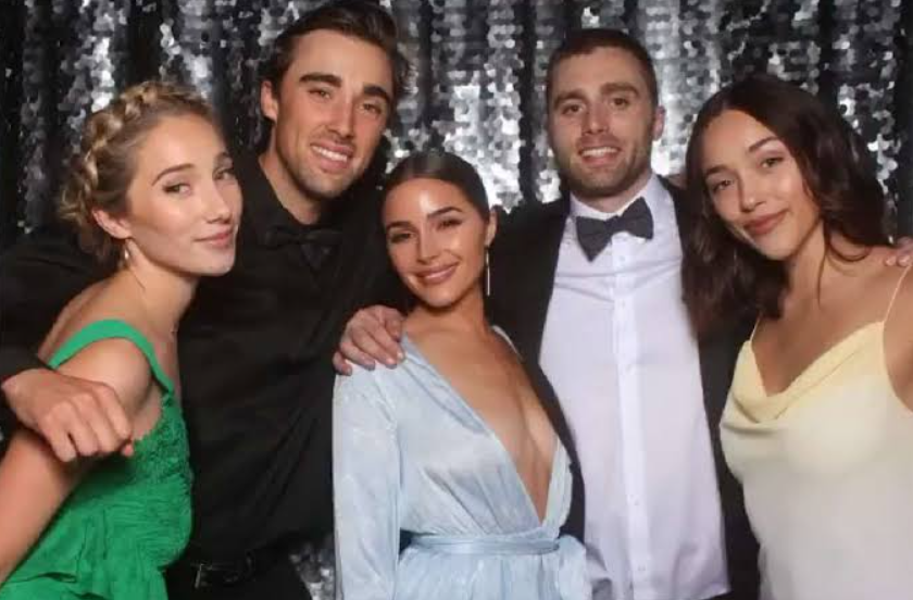 Olivia Culpo siblings Aurora, Sophia, Gus, and Pete Culpo posing together at a family gathering showing their close bond