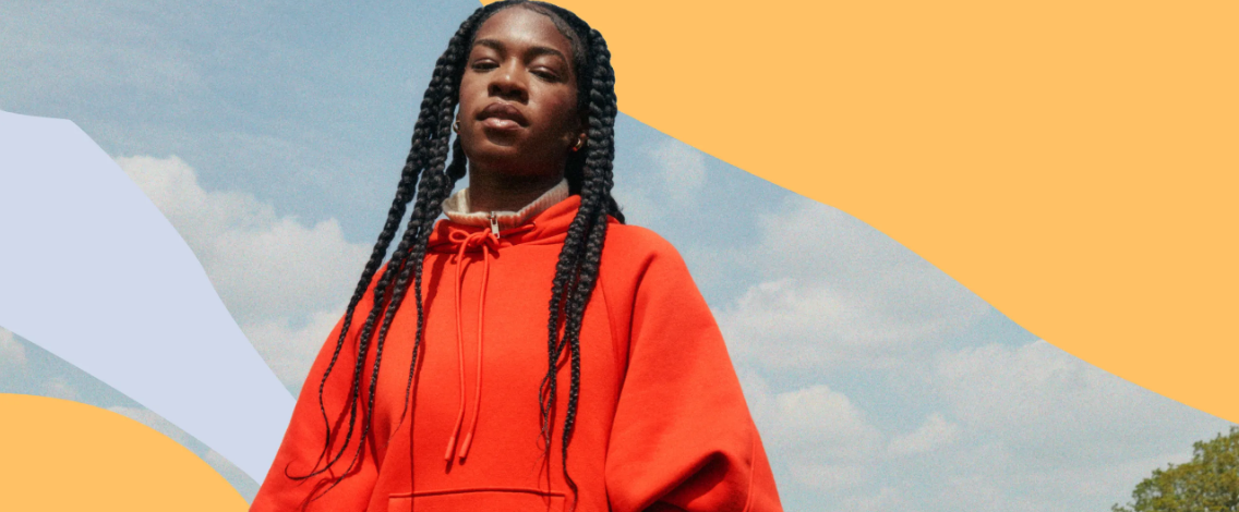 Portrait of British actress Precious Mustapha showcasing her natural, grounded style.
