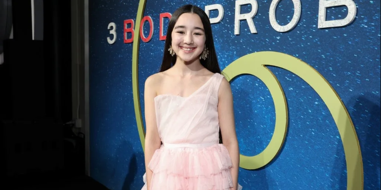  Young actress Eve Ridley posing for a portrait, set to play the character Ruthye Marye Knoll in the 2026 Supergirl film.  Image 2: Milly Alcock and Eve R