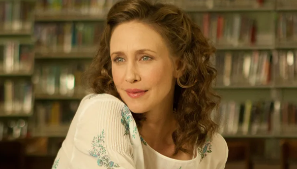 A professional portrait of actress Vera Farmiga during a red carpet event, showcasing her elegant style.