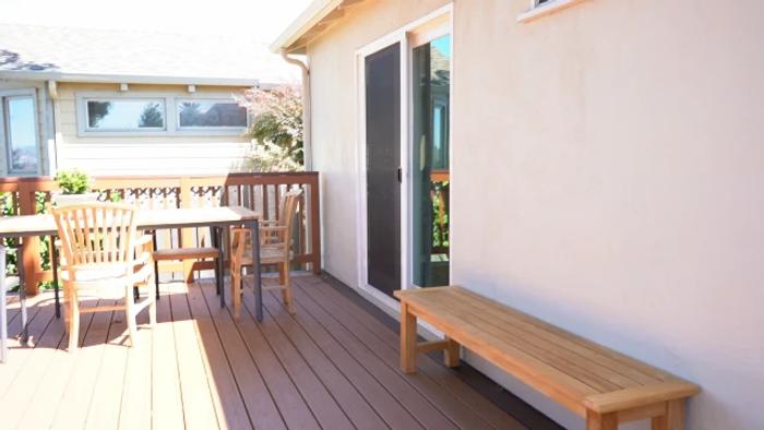 TREX deck — sliding door access and bench