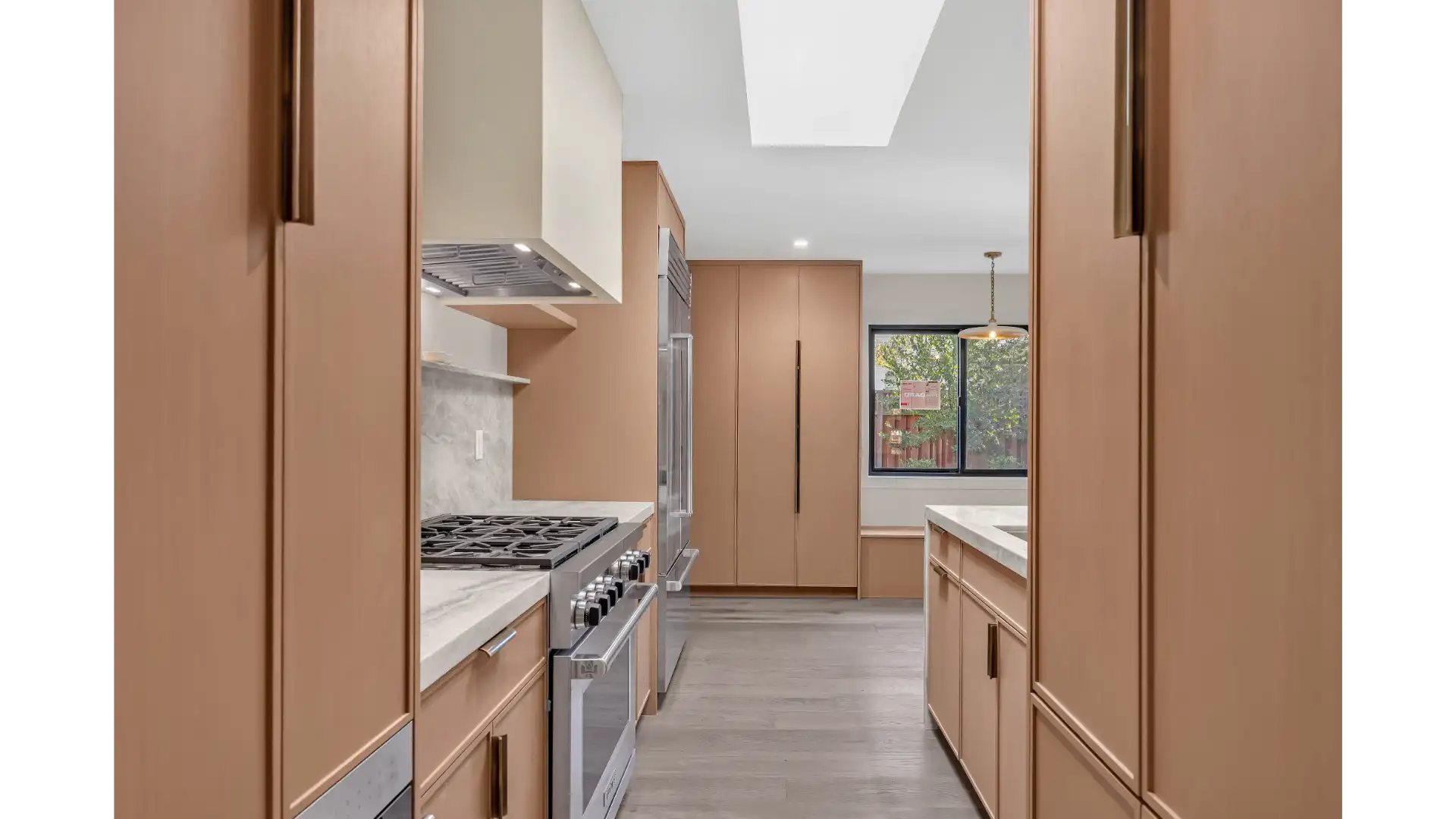 Finished kitchen remodel by Bark and Build Builders featuring premium countertops
