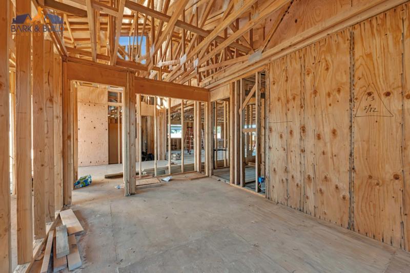 Deep foundation system — helical piers driven through Bay Mud to load-bearing strata