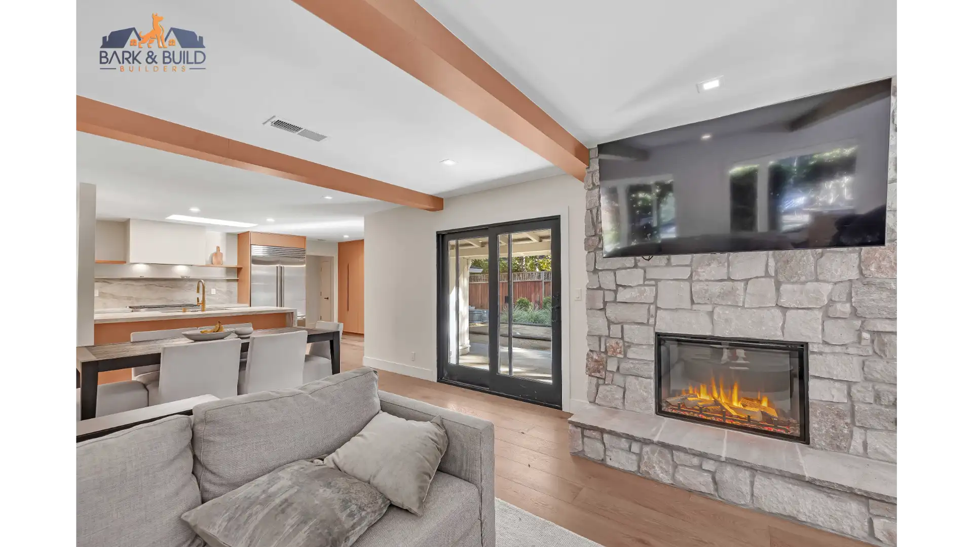 Completed JADU — modern living room with efficiency kitchen