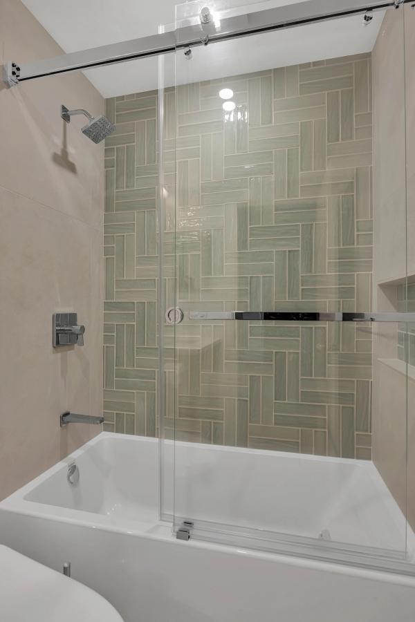 Master bath, walk-in shower with floating bench and recessed niche