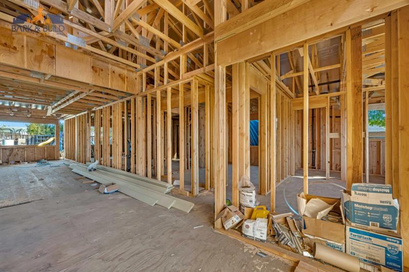 Load-bearing wall removal — LVL beam installation during kitchen design execution