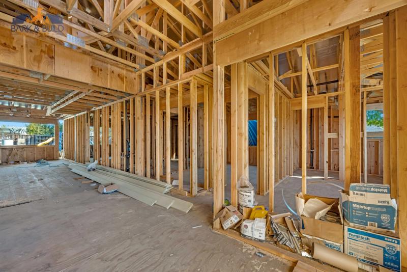 Load-bearing wall removal — LVL beam installation during kitchen design execution