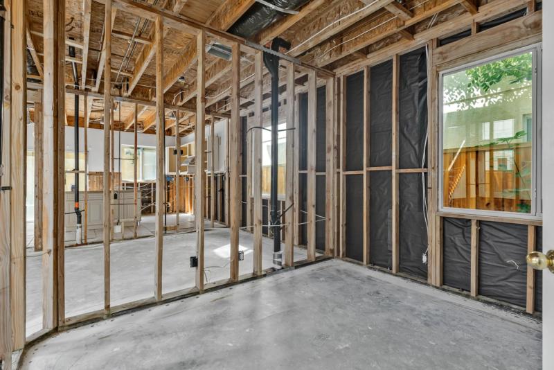 Load-bearing wall removal — structural framing and beam installation
