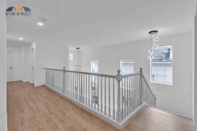 Friendly Acres addition — seamless stucco matching between 1940s original and new expansion