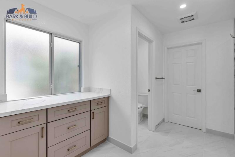 Completed room addition — expanded living space with premium finishes