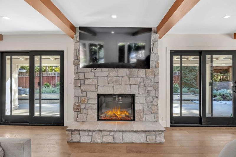 Kitchen, complete renovation wide view with skylight and continuous hardwood flooring