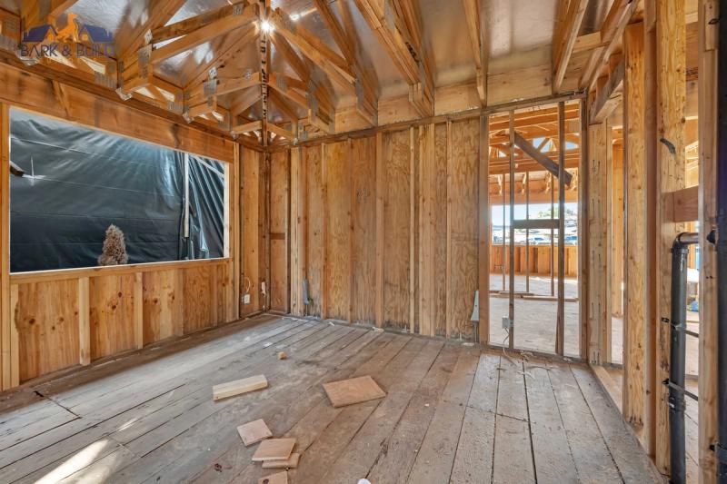 Slab trenching for garage conversion — PVC waste line installation in concrete floor