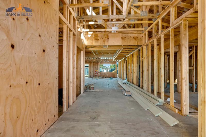 Construction phase — electrical and plumbing rough-in during kitchen remodel