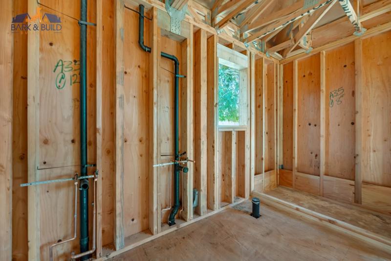 Engineered LVL beam installation — structural kitchen support