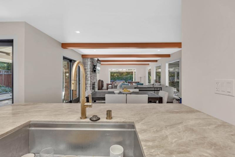 Walk-in closet, custom built-in shelving with integrated LED strip lighting