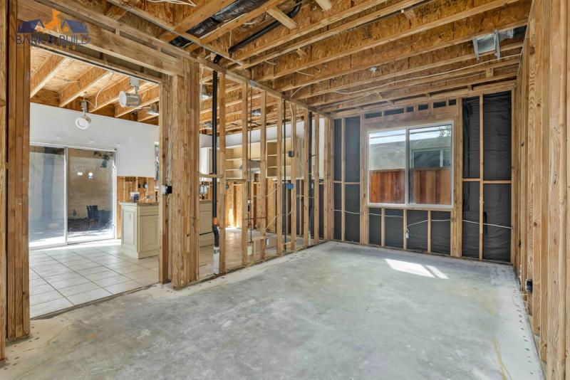 WUI-compliant deck construction — ignition-resistant materials and enclosed soffits