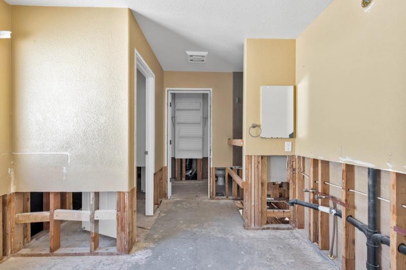 Electrical rewiring during kitchen demolition — Woodside Plaza home