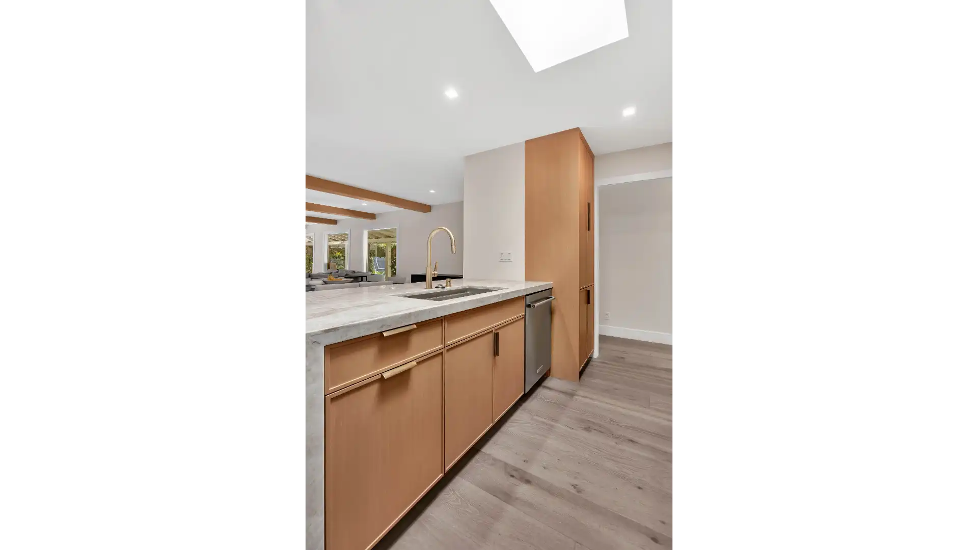 Open concept kitchen — continuous sightlines and panel-ready appliances