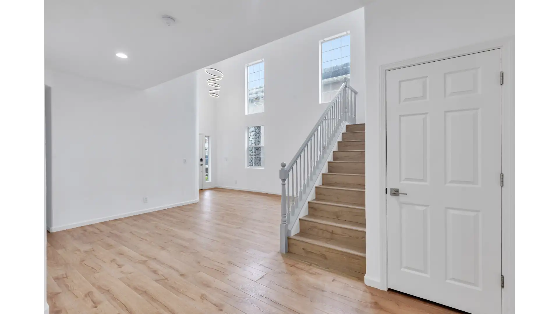 Completed whole-home renovation — modern open-concept interior with premium finishes