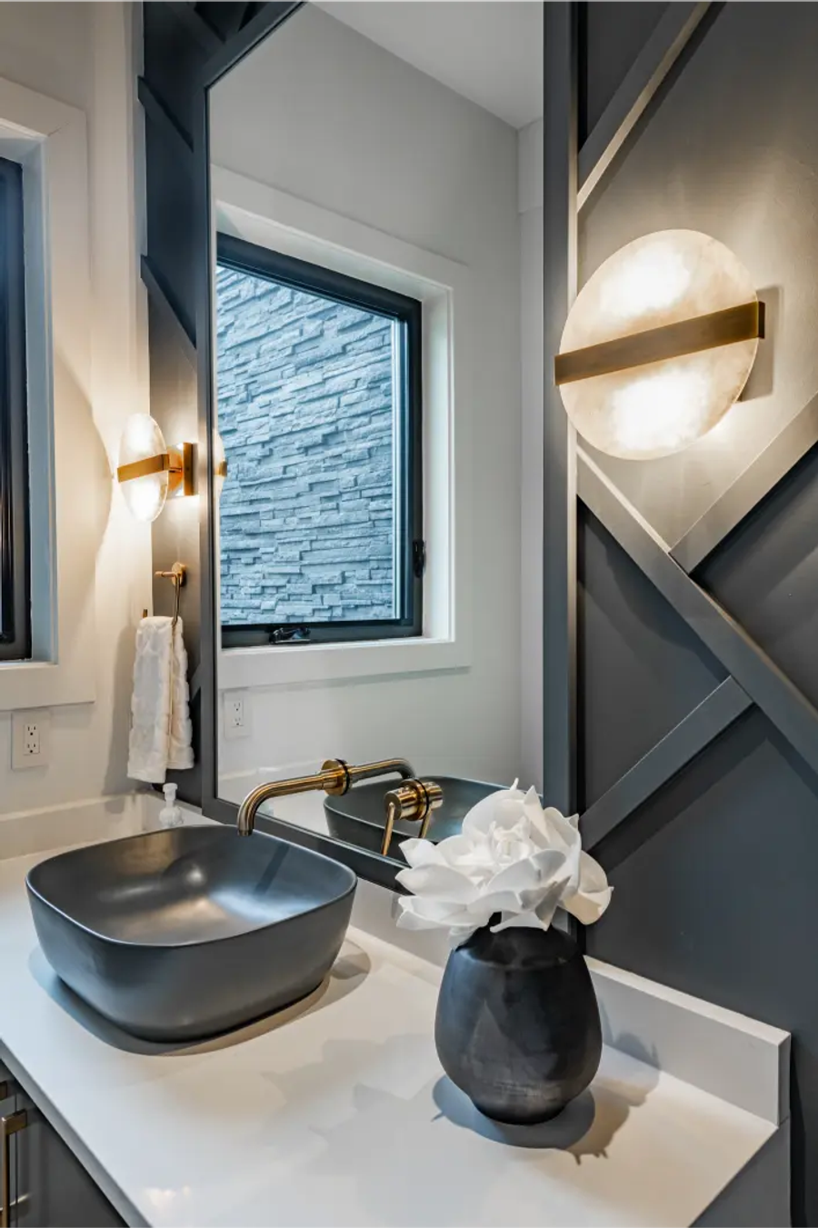 Modern bathroom remodel with white vanity, black fixtures, and large mirror — Bark and Build serves the full San Mateo County peninsula
