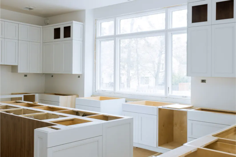 JADU efficiency kitchen installation — compact cabinetry and plug-in appliances