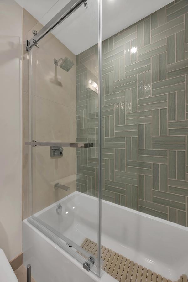 Master bath, shower interior detail with bench and tile inlay niche