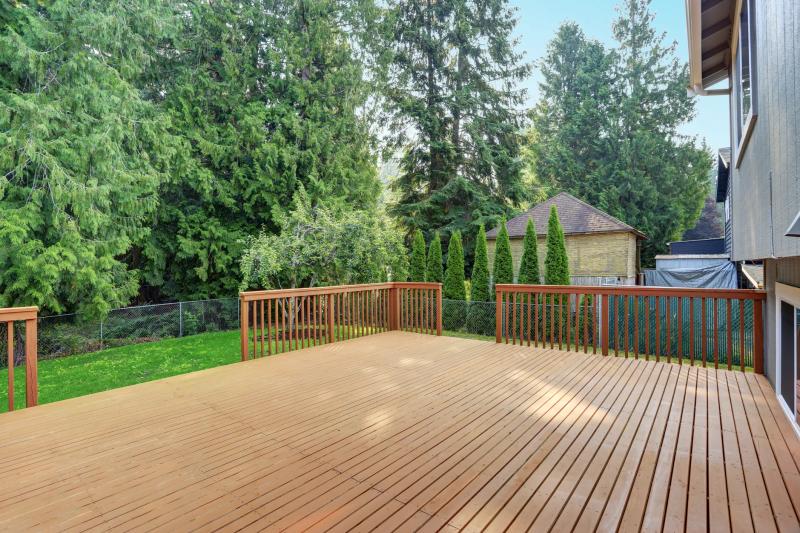 Wide low-profile deck with composite boards — Bay Area backyard