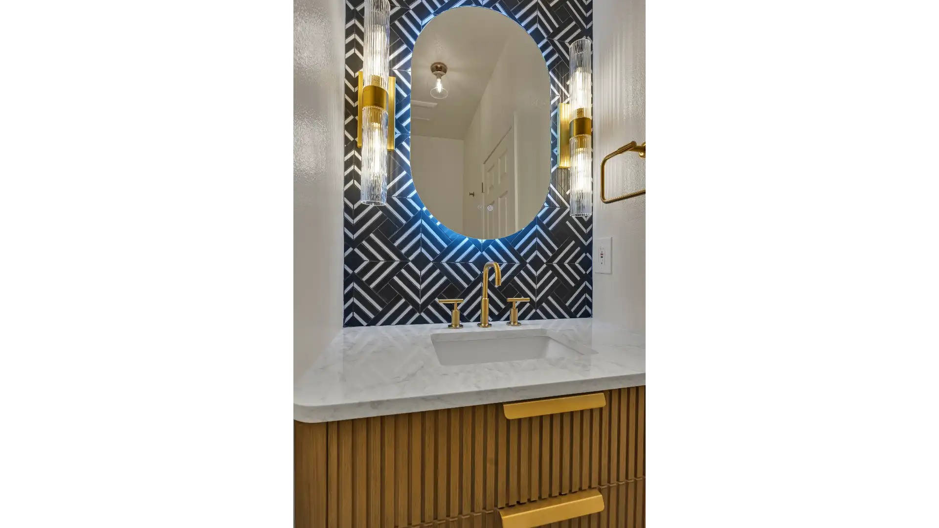 Bathroom renovation — floating vanity and large-format tile installation