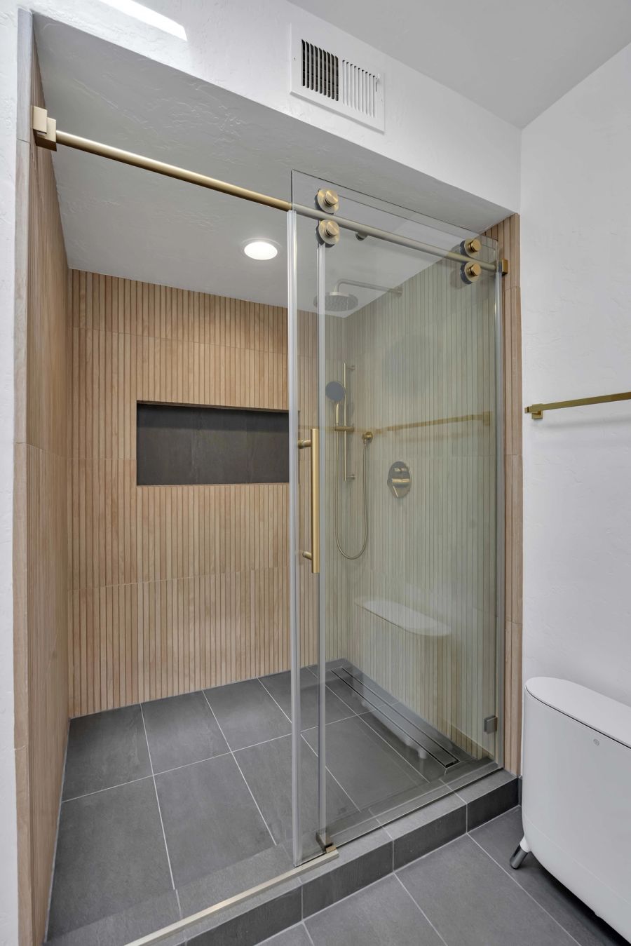 San Francisco master bathroom — walk-in shower with fluted tile