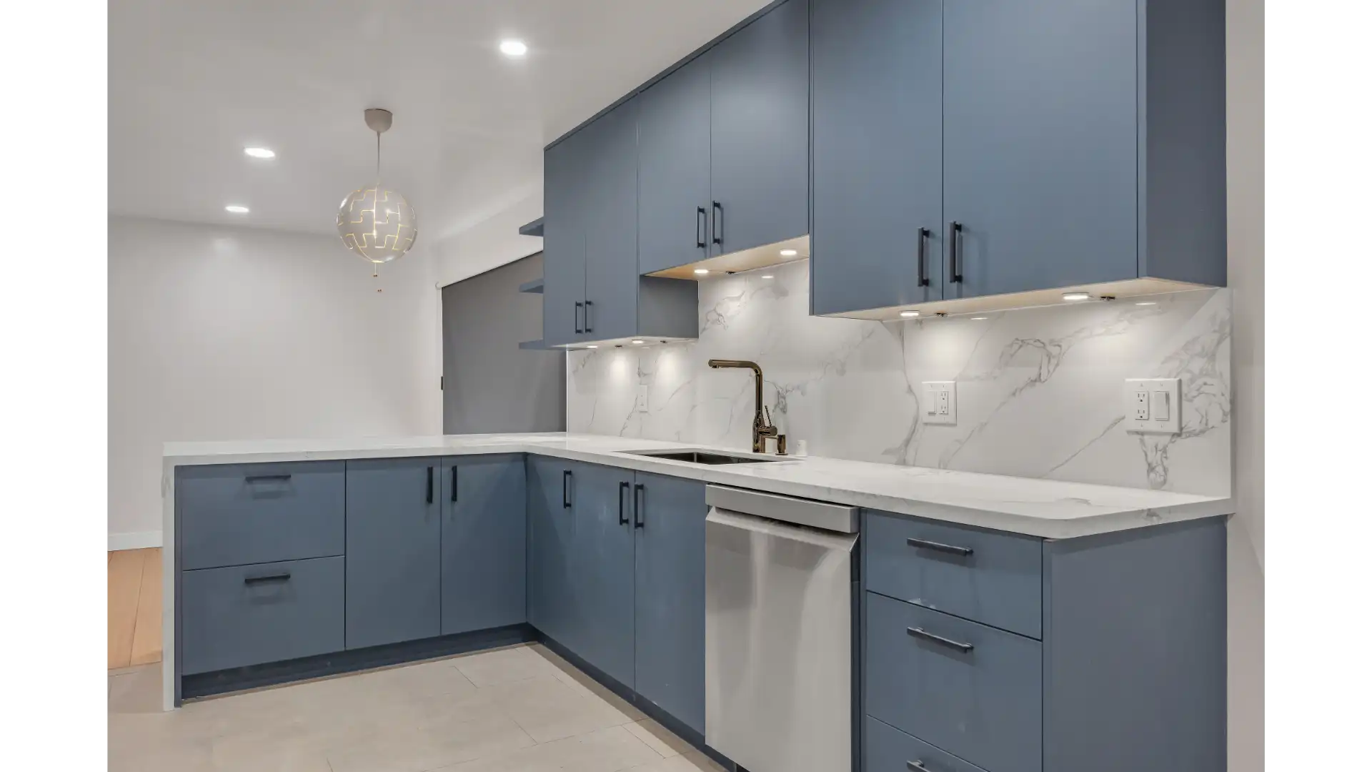 Kitchen, L-shaped counter and cabinetry