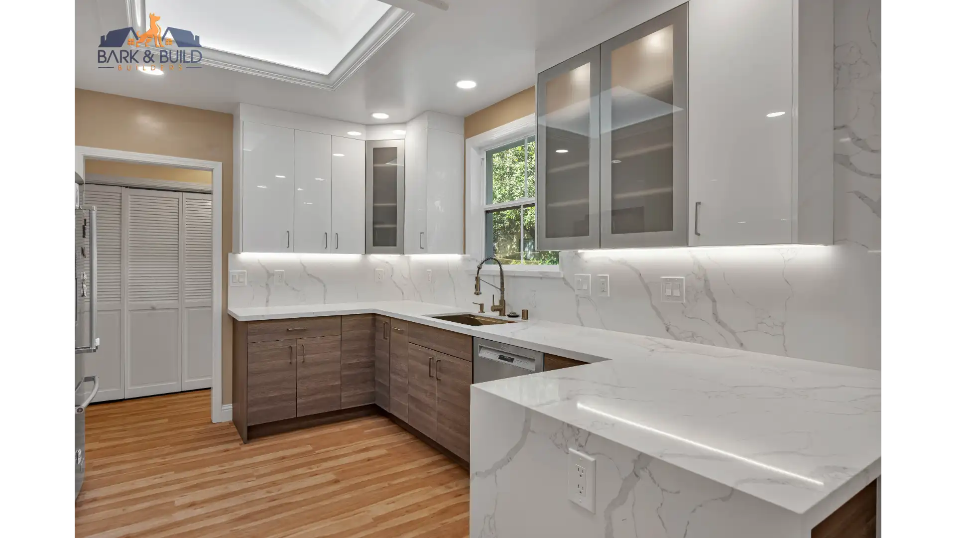 Kitchen island with pendant lighting and premium countertops