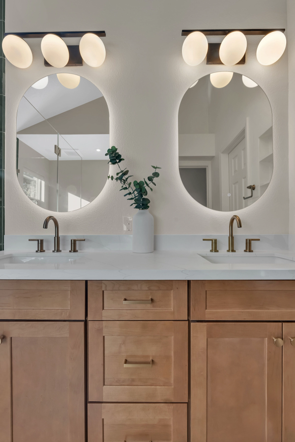 Master bath, double vanity closeup with quartz countertop and brushed gold faucets