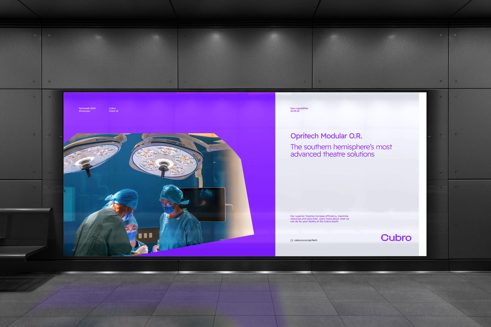 A wide rear-illuminated billboard features a Cubro design.