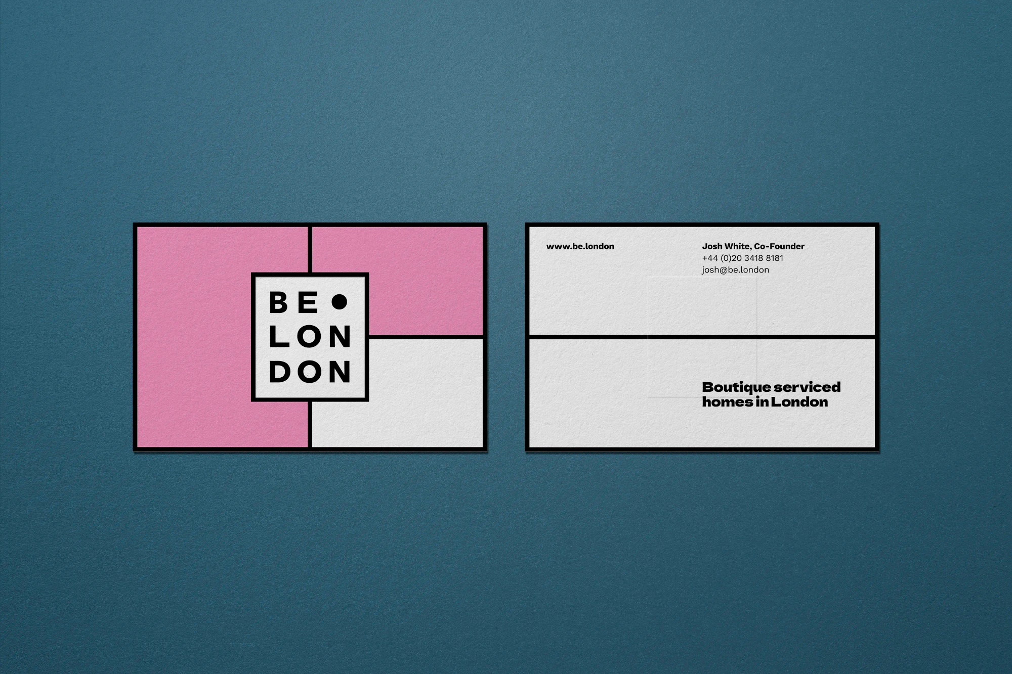A business card's front and back on display.