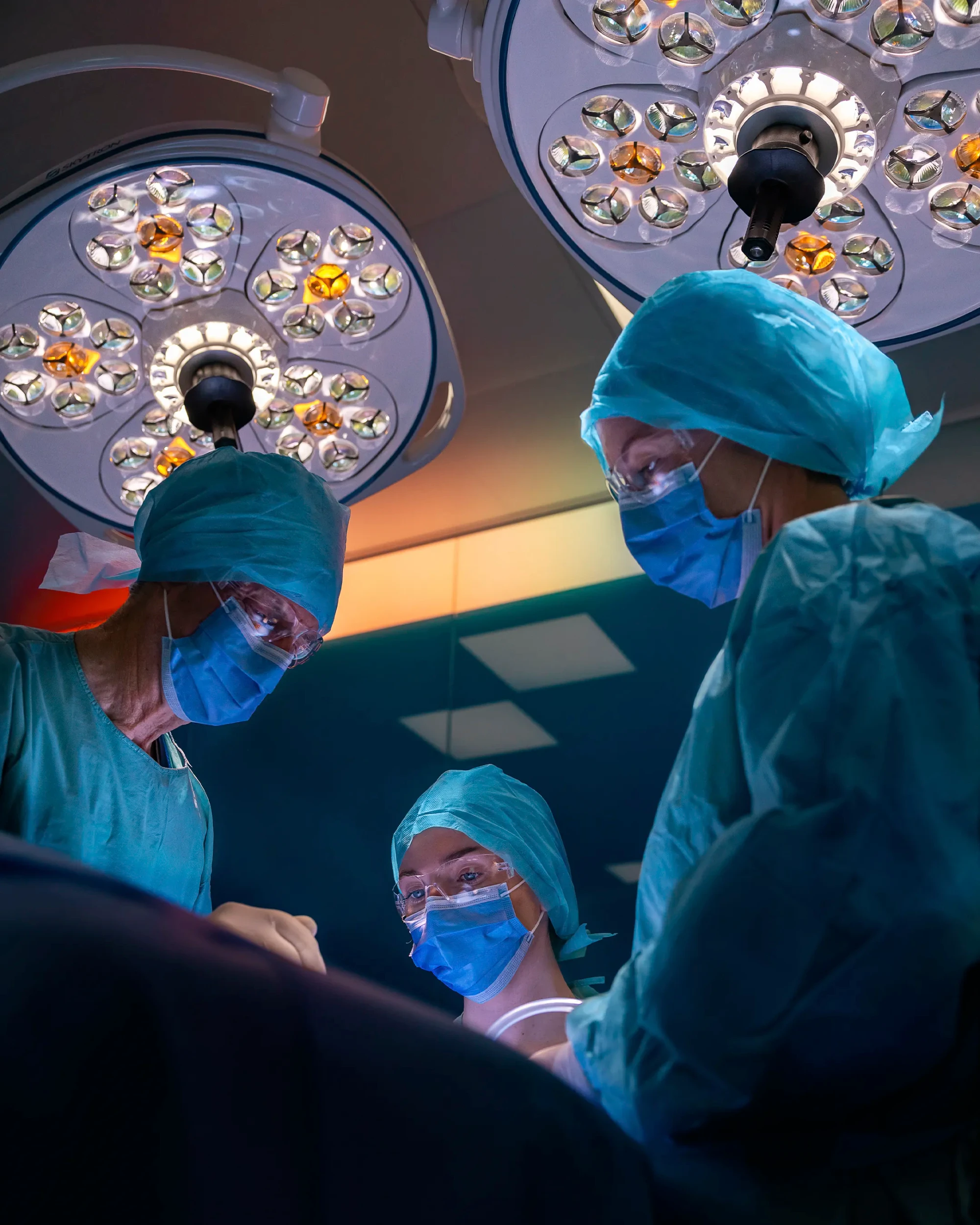 Surgeons operate under Cubro's operating room lights.