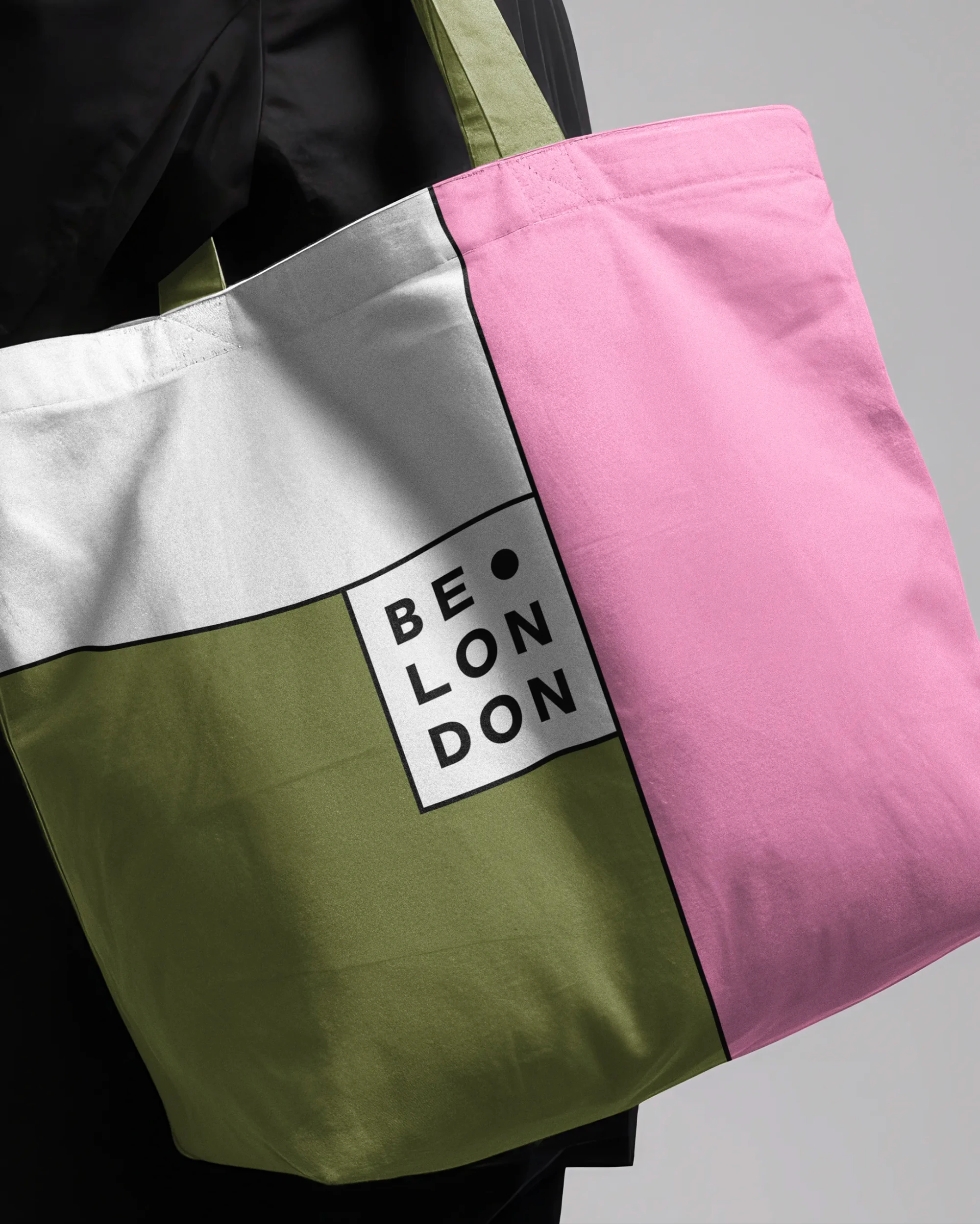 A colourful branded tote bag features the Be London logo at the centre.