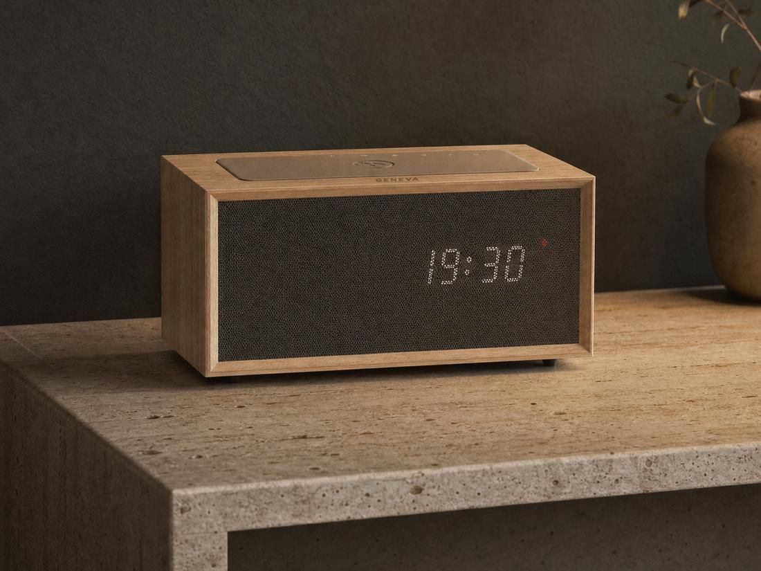 A Geneva Time digital in oak on a travertine console in a hotel suite