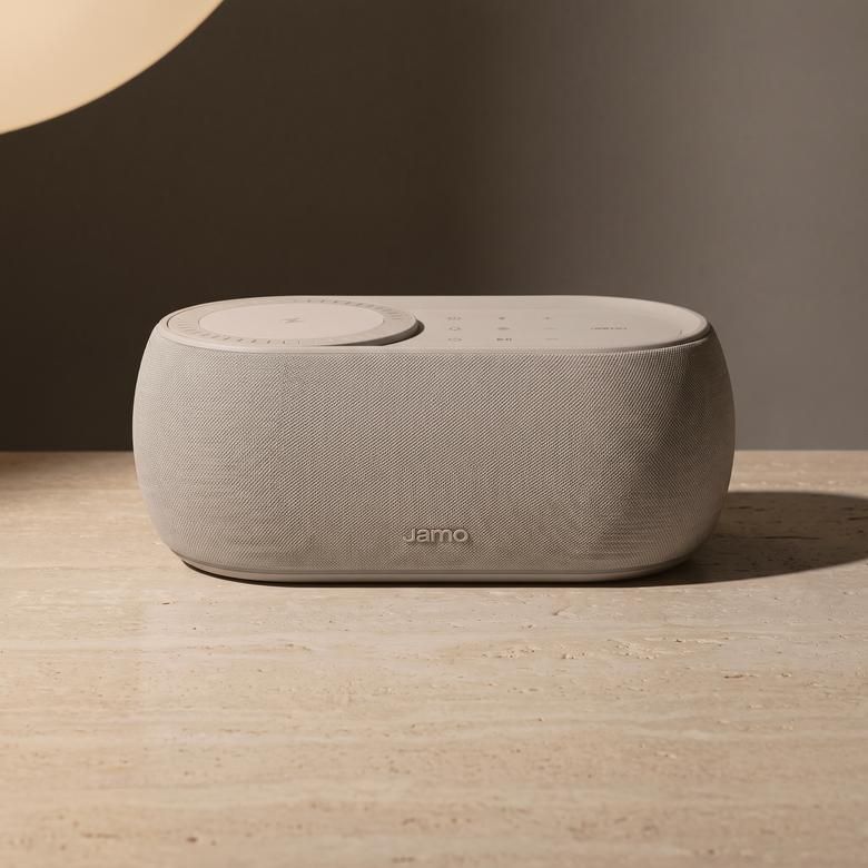 A Jamo HYG Reflect in light grey on travertine, also made in dark grey