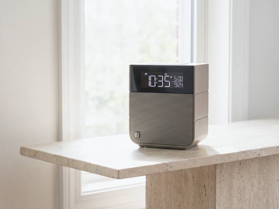 A Soundfreaq Sound Rise II on a stone plinth by a window in daylight