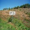 
			
				Project: Signs; Image Title:  Sign and Clear Cut - Cape Breton, Nova Scotia (2004) 
			
		