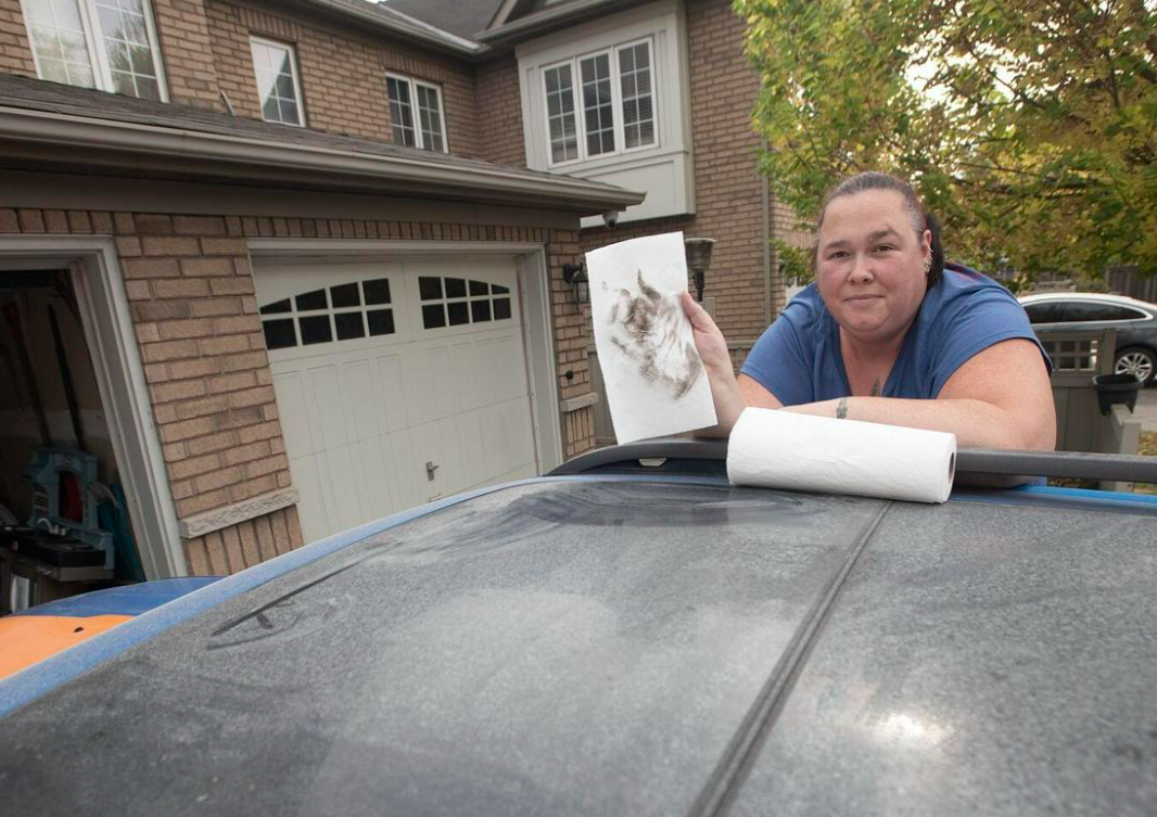 Hamilton beach strip residents blanketed with shiny, mystery fallout photo