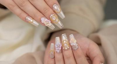 3D charms and embellished nail design