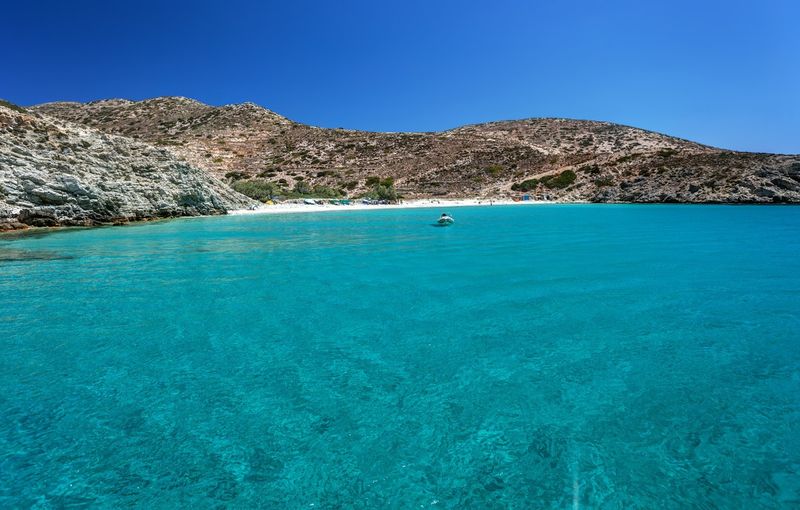 Sandy beach with transparent waters, in Donousa island, Greece