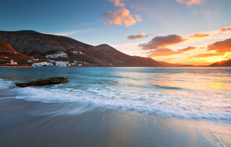 View of Aegiali village from a nearby beach, Amorgos island, Greece.