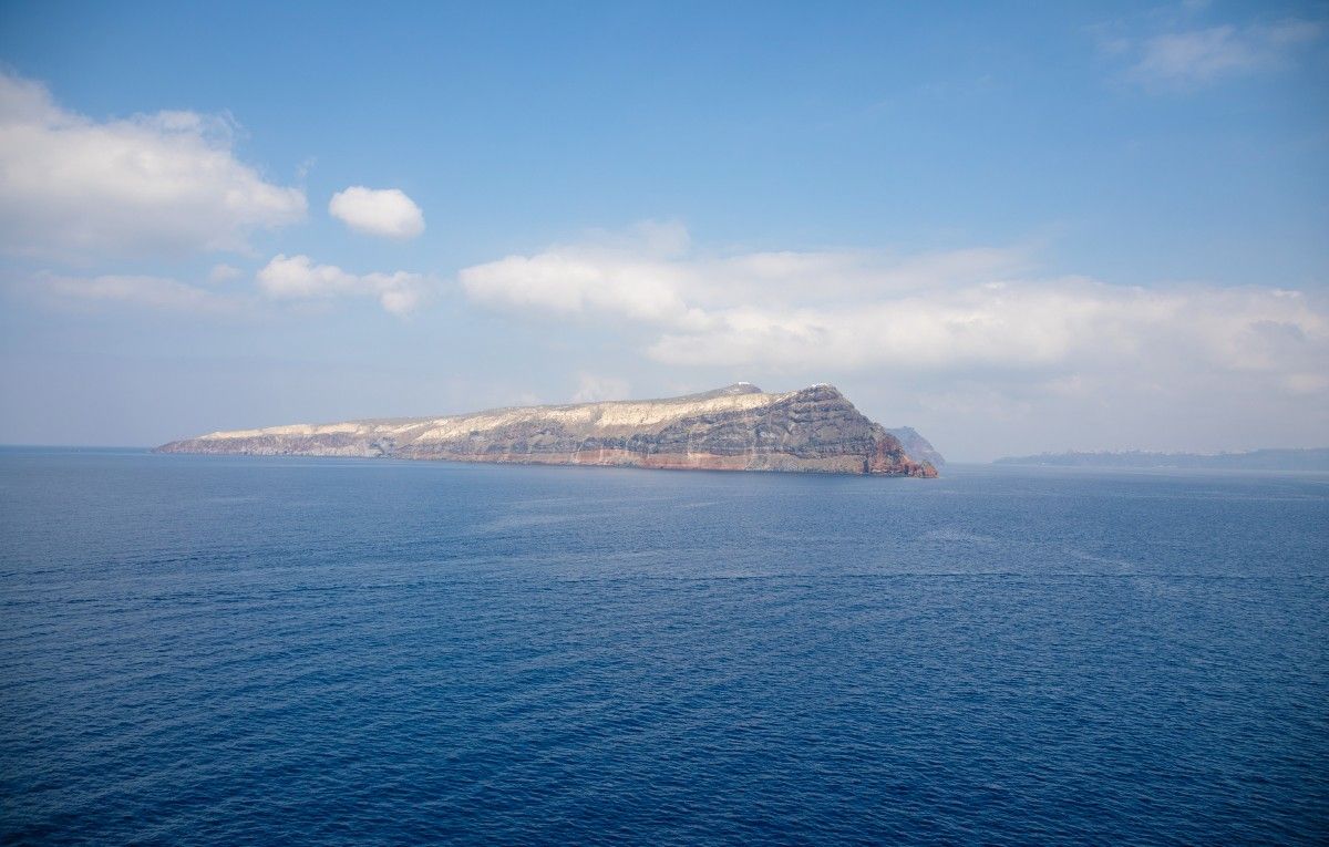 View of Thirasia from Sea Next to Santorini, Greece